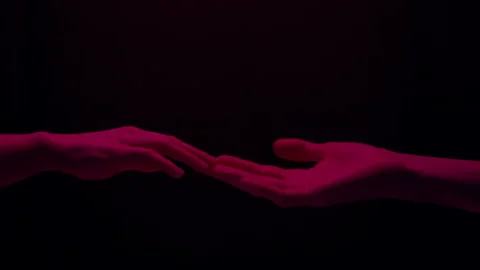 touch-female-and-male-hand-footage-146124973_iconl